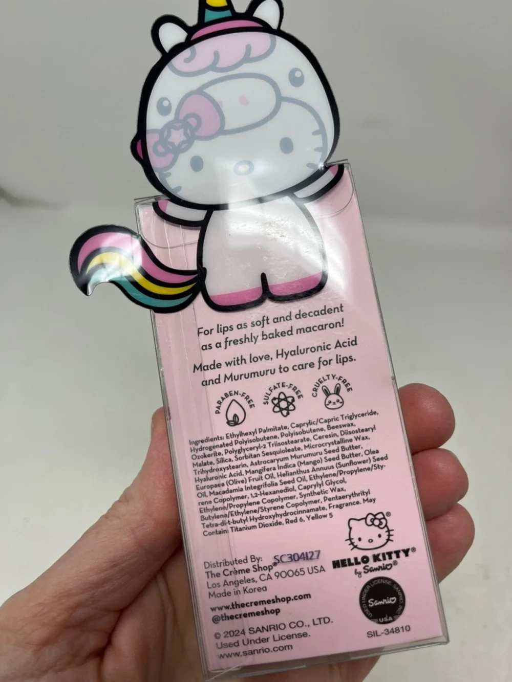 HELLO KITTY BUNDLE 7 -BEANIE, 2 KEYCHAIN, CRÈME SHOP BATH BOMB LIP BALM, CHARM